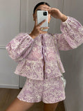 Conjunto lila bordado floral - vista frontal puesto