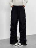 Pantalón cargo deportivo negro con pliegues niña adolescente - vista frontal
