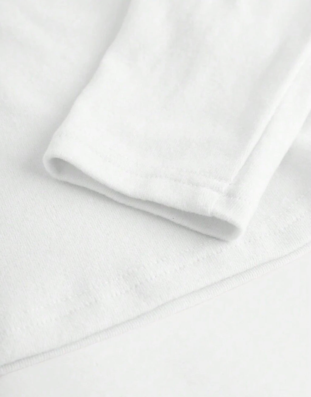 Camiseta manga larga hombros descubiertos blanca - detalle tela
