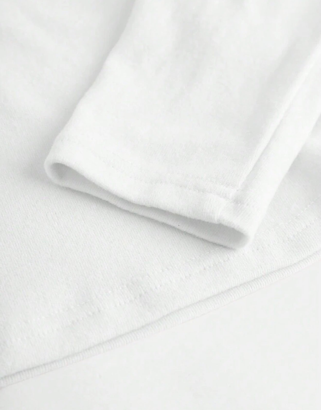 Camiseta manga larga hombros descubiertos blanca - detalle tela