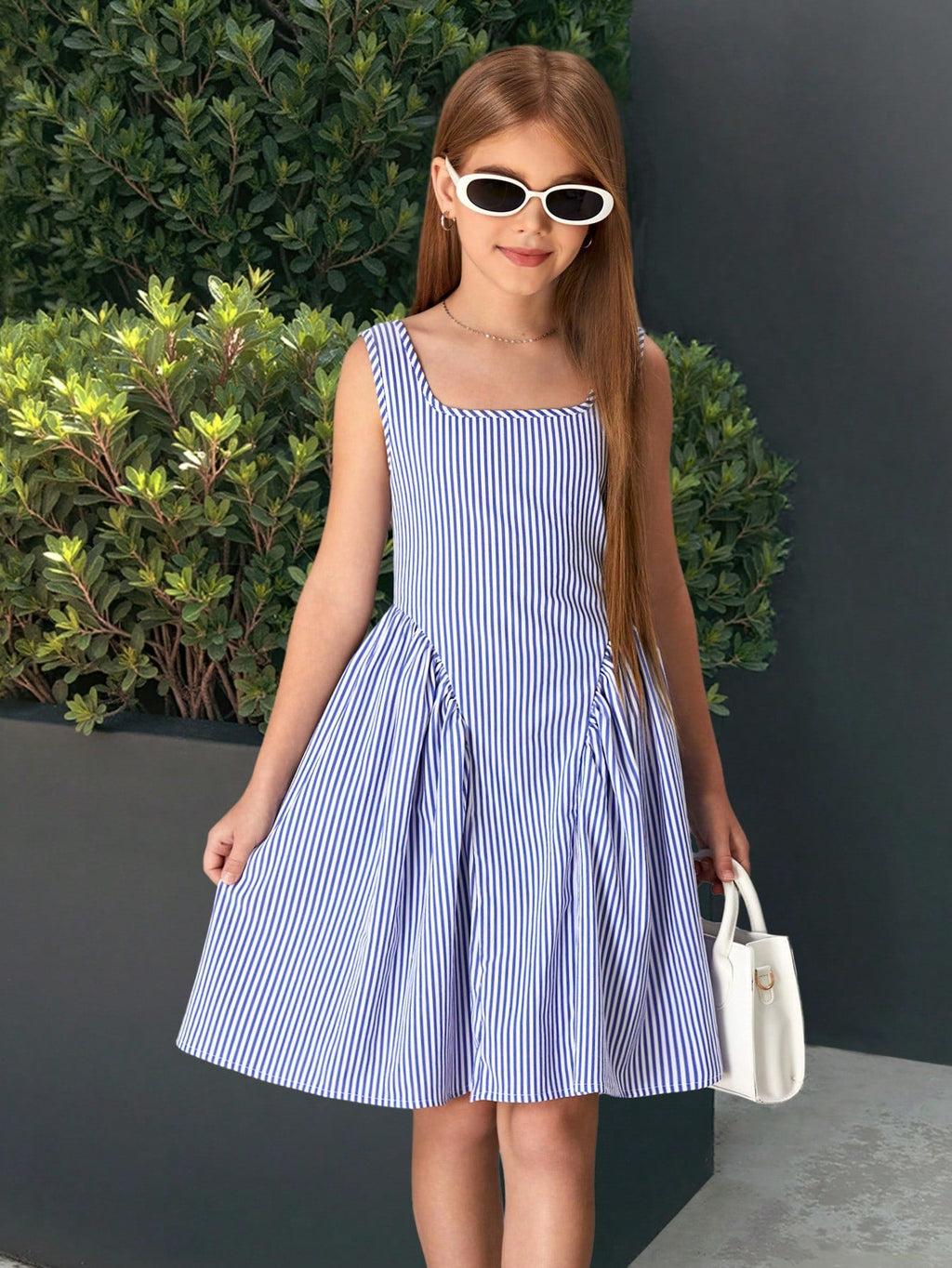 Vestido mini a rayas azul - vista trasera con lazo