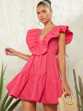 Vestido corto rosa con volantes - vista frontal